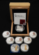Cook Islands: SILVER: Group of eight coins, comprising five 2005 Pope John Paul II $1 proofs, two 2007 World Monuments Chile Isla De Pascua $10 proofs, and one 2009 Season's Greetings $5 uncirculated rectangular coin. (8).