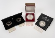 SILVER KOOKABURRAS: Group of four Perth Mint issues, all in presentation cases with CoA, comprising 1993 1oz Kookaburra proof, 1996 2oz Star Pagoda Kookaburra, together with two 1992 NAA Australian International Coin Fair Sydney Sesquicentenary 1oz Holey 