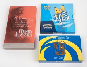 Group of three RAM uncirculated coin sets, comprising 2017 Bananas in Pyjamas (two-coin), 2022 Henry Lawson (three-coin), and 2002 XVII Commonwealth Games (three-coin).