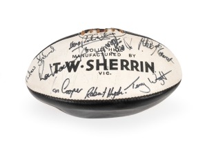 COLLINGWOOD: Circa 1977 black and white Sherrin football signed by twenty-two players, including Len Thompson, Lex Pritchard, Gerald Betts, Stan Magro, Shane Bond, Peter Moore, Andrew Ireland, and others.