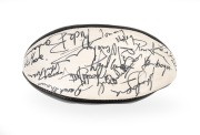 COLLINGWOOD: Circa 1977 black and white Sherrin football signed by twenty-two players, including Len Thompson, Lex Pritchard, Gerald Betts, Stan Magro, Shane Bond, Peter Moore, Andrew Ireland, and others. - 2