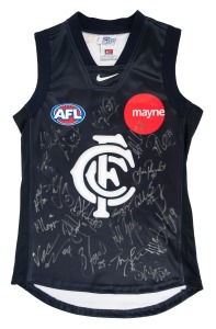 CARLTON: Nike guernsey (size M), signed by numerous 2002 squad members including Anthony Koutoufides, Andrew McKay, Simon Beaumont, and Adrian Hickmott.