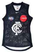 CARLTON: Nike guernsey (size M), signed by numerous 2002 squad members including Anthony Koutoufides, Andrew McKay, Simon Beaumont, and Adrian Hickmott.