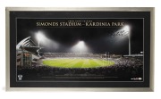 GEELONG - FROM DAWN TO DARK - SIMONDS STADIUM - KARDINIA PARK: Attractively framed and glazed limited edition [#80/100] panoramic photograph, signed by 2013 Captain Joel Selwood, depicting the first night game in June 2013, with CoA; 59 x 103cm overall.