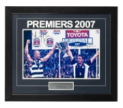 GEELONG: 2007 Premiership photographic display, depicting captain Tom Harley and coach Mark Thompson celebrating the largest-ever AFL Grand Final winning margin of 119 points; signed by Harley and Thompson, attractively framed and glazed, 55.5 x 65.5cm ov