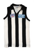 COLLINGWOOD 1990 PREMIERSHIP: Paul Hawke's Sekem guernsey, "1990 94th Grand Final" and "Spicers Paper" patches on front, number 4 on back. After two strong years with Collingwood, Hawke had to spend the 1990 season in the reserves due to persistent injuri