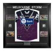 MELBOURNE STORM: Guernsey signed by the full Premiership-winning squad, attractively framed and glazed, together with four photographs and two Melbourne Storm plaques; the players who scored tries and goals in the Final in which they defeated the Parramat