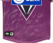 MELBOURNE STORM: Guernsey signed by the full Premiership-winning squad, attractively framed and glazed, together with four photographs and two Melbourne Storm plaques; the players who scored tries and goals in the Final in which they defeated the Parramat - 2