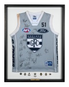 GEELONG: Match-worn clash/away guernsey signed by the 2005 team, attractively framed and glazed, together with various Geelong Football Club membership fobs, 90 x 71cm overall. - 2