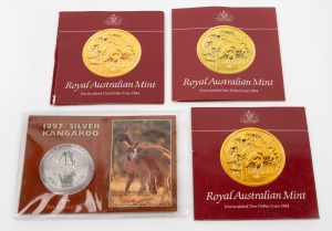 1984 $1 Uncirculated coins (3), carded; together with 1997 RAM $1 fine silver Kangaroo, carded. (4 items).