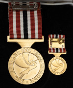 NEW ZEALAND: 1990 New Zealand Commemoration Medal, with ribbon in case of issue; together with the miniature. (2 items). - 3