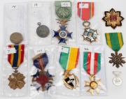 AFRICA & SOUTH AMERICA: A small range comprising medals from MADAGASCAR, Republic of CONGO, GABON, MEXICO, BOLIVIA, URUGUAY and C.A.R. Also, a "Three Pound Twelve - Double Joe" (Total: 11 items).