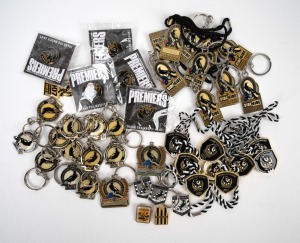 COLLINGWOOD: Group of more than forty keyrings, fobs, and badges, mainly 2010s, with motifs including 2023 Premiers, Collingwood Supporters Group, Side By Side, Social Club Member, and others. (40+ items)