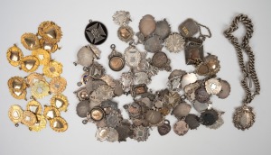 5 · An accumulation of early 1900s sterling silver local sporting medallions (weight approx. 560g), many with 9ct gold details, mostly uninscribed but noted 1906 VRA Cadet Matches, 1936 Ngongotaha Irish Jig, and 1953 Lilydale Dancing, together with twenty-one 9ct gold lined examples. (90+ items)