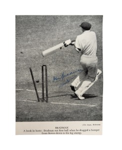 BRADMAN OUT FIRST BALL when he dragged a bumper from BOWES down to his leg stump during the Second Test of the Bodyline Series (Adelaide, December 1932); a fine pen signature of Bradman on a magazine picture depicting him and his shattered wicket.