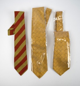 248 · MARYLEBONE CRICKET CLUB: "Egg and bacon" silk tie, together with two 1997 World Series Cricket 20th anniversary ties, still in packaging. (3 items)