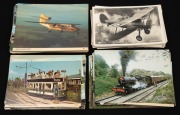 POSTCARDS - TRAINS, PLANES, AND AUTOMOBILES: Diverse accumulation issued in decades spanning the 1900s to the 1980s, the planes and automobiles mainly military in nature; mostly unused. (100+ items)