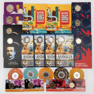 Group of RAM carded uncirculated coin issues, comprising 2019 $1 Melbourne ANDA "Mob Of Roos" (2), 2019 $1 Sydney ANDA "Mob Of Roos" (2), 2021 20c "Animalia" (4), 2022 50c "Christmas Beetle" set of five, 2022 $1 "Wallal Centenary" (2), 2022 50c "Tamworth 50th Anniversary" (2), 2022 $1 "Smith Family Centenary" (3), and 2023 $1 "Aussie Big Things" ten-coin set (2). (22 items)