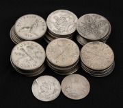 Two Shillings: Group of thirteen 1910-1945 types, together with nineteen 1946-1963 types (including some commemoratives), plus two 1910s shillings; mixed condition. Including one forgery. (34 items)
