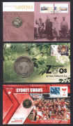 An album containing nineteen Australia Post PNCs, spanning the years 2012 to 2013, including noted 2012 Sydney Swans Premiers, 2013 Diamond Jubilee Coronation (two-coin set), 2013 "Celebrating the Queens' Coronations" (two-coin set), 2013 "Centenary of th