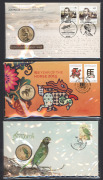 An album containing twenty-four Australia Post PNCs, spanning the years 2006 to 2015, including noted 2013 Holey Dollar And Dump, 2014 Year Of The Horse, 2014 "King George V: Centenary Of Stamps" (medallion), 2015 "Birth Of A Princess", and others.