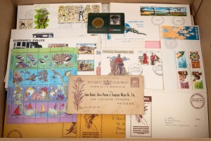 A.A.T., P.N.G., Norfolk Island, Guernsey, Australia FDCs and stamps as received as new issues, circa 1970s-90s in a medium-sized box. (qty)