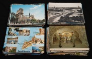 POSTCARDS - CONTINENTAL EUROPE: An accumulation of more than two hundred and forty postcards, issued in years spanning the 1910s to the 1970s, featuring views of such cities as Amsterdam, Venice, Trieste, Paris, Marseille, and many others. (240+ items)