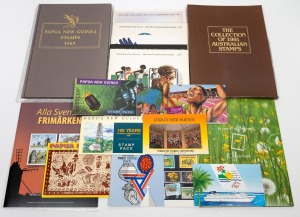 USA 1976 - 1979 Commemorative Stamps Year Folders; Sweden 2001-2004 issues in two packs; Australia 1981 Yearbook; Papua New Guinea 1989 Yearbook plus several packs. All MUH.