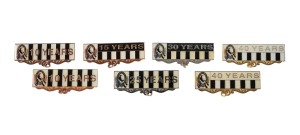 COLLINGWOOD: Group of seven membership badges marking ten (x2), fifteen, twenty-five, thirty, and forty (x2) years of dedication.