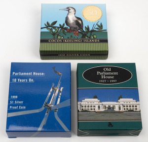 $1 SILVER PROOFS: Group of three 1oz coins, all in presentation cases with box and CoA, comprising RAM 1997 "Old Parliament House", RAM 1998 "Parliament House: 10 Years On", and Perth Mint 2005 "Cocos (Keeling) Islands - 50th Anniversary Australian Territory". (3 items)