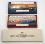 $10 REVERSE-FROSTED SILVER COINS: Two RAM two-coin sets, both in presentation cases with box and CoA, comprising 1998 "Coins Of The Victorian Capital" and 1997 "Coins Of The Harbour City", plus 1998 "Australia's Endangered Species" four-proof set (sterlin