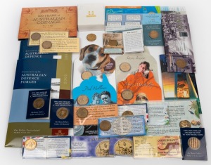 Group of commemorative $1 coin issues, released in decades spanning the 1980s to the 2000s (mostly carded type), including noted 2010 "100 Years of Australian Coinage" four-coin set, 2001 "Anniversaries of the Australian Defence Forces" three-coin set (2), and 1984 Mob of Roos proof; FV $41.