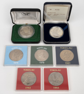 NEW ZEALAND: TOKELAU: 1978 "Breadfruit" silver $1 Tahi Tala and 1983 "Water Conservation" silver $5 Lima Tala, both in presentation cases, together with 1978, 1979, 1981, 1982, and 1983 copper-nickel $1 Tahi Talas. (7 items)