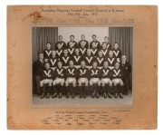 VICTORIAN "BIG V" STATE REPRESENTATIVE TEAM 1950: Original team photograph titled "Australian National Football Council Carnival at Brisbane - 19th-29th July, 1950", with players' names printed on the mount, 30 x 37cm overall. (NB: laminated)