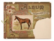 HANDASYDE, Stewart, "Album of Melbourne Cup Winners 1861 - 98", designed and lithographed by Stewart Handasyde, [Melbourne : Mason, Firth & McCutcheon, 1898], oblong quarto, chromolithographed wrappers (with large loss at lower right), 42pp. Includes port