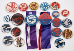Group of nineteen 1950s to 1970s tin badges, two with ribbons, mostly comprising Melbourne, North Melbourne, South Melbourne, Essendon, and St Kilda. (19 items)