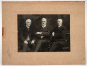 H.C.A. HARRISON: Original mounted photograph (22.5 x 30cm overall) by Talma & Co. Melbourne, showing Harrison seated at left beside what are thought to be T.S. Marshall (VFA Secretary, middle) and E.L. Wilson (VFL Secretary, at right); believed to have be - 2
