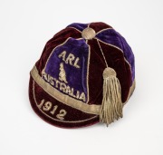 AN AUSTRALIAN KANGAROO TOUR TEAM 1912 HONOUR CAP, awarded to a member of the team which toured Great Britain, where they became the first-ever touring side to win The Ashes; maroon and deep navy velvet, with wire embroidered "ARL (kangaroo) AUSTRALIAN" ov - 2