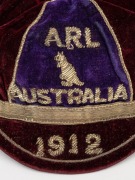 AN AUSTRALIAN KANGAROO TOUR TEAM 1912 HONOUR CAP, awarded to a member of the team which toured Great Britain, where they became the first-ever touring side to win The Ashes; maroon and deep navy velvet, with wire embroidered "ARL (kangaroo) AUSTRALIAN" ov - 6