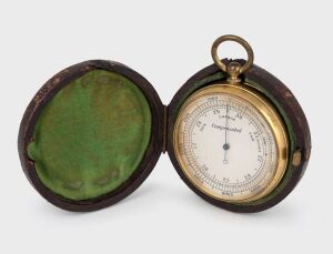 An antique pocket barometer in original plush leather case, 19th century, ​​​​​​​7cm high including bow.