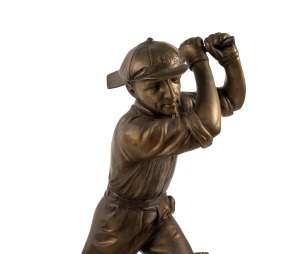 DONALD BRADMAN: Bronze statuette on jarrah plinth with plaque "The Cricketer Of The Century", limited edition 166/200, approx. 53 x 36 x 25cm; framed trading card (17 x 14.5cm overall) with original Bradman signature has been attached to the base (later addition).