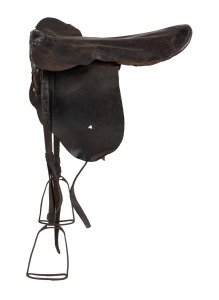 THE SADDLE USED BY DANNY MAHER WHEN HE RODE THE WINNERS OF THREE ENGLISH DERBYS: ROCK SAND in 1903, CICERO in 1905, and SPEARMINT in 1906, as well as numerous other races Maher rode for King Edward VII, however the king's horses were raced under the name of the Duke of Devonshire. The saddle is accompanied by the two original American Railway Express Co., baggage labels that were affixed to the packaging when the saddle was sent by Joe Longton from America, to Aubrey Robinson, his old friend