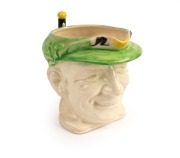1936 Don Bradman toby jug manufactured by Marutomo Ware, with cap in green, height 15cm. - 2
