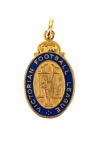 SIMON MADDEN'S VFL LIFE MEMBERSHIP MEDAL: 1988 enamelled medal with text "Victorian Football League", engraved on reverse "S. Madden".