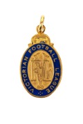 SIMON MADDEN'S VFL LIFE MEMBERSHIP MEDAL: 1988 enamelled medal with text "Victorian Football League", engraved on reverse "S. Madden".