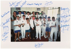 185 · WORRELL TROPHY 1997: Fifteen examples of a photograph depicting the triumphant Australian team, signed in the margins by all fifteen players and officials, including Mark Taylor, Glenn McGrath, Andy Bichel, Steve Waugh, Ian Healy, Geoff Marsh, and Shane Warne; each overall 21.5 x 30cm.