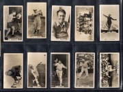 LAMBERT & BUTLER - R.T. JONES: 1926 "Who's Who In Sport" real photo part-set [12/50] plus 1 duplicate, including noted R.T. Jones (rare) and Rene Lacoste, together with 1927 "The World Of Sport" real photo part-set [13/50]. (26 items) - 2