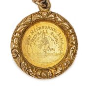 WEST MELBOURNE ALMA FOOTBALL CLUB: An 1889 fob (18ct gold) with chain (15ct gold), 49 grams total, inscribed "Alma Football Club - Presented By T.F. Flanagan For Best All Round Player Season 1889 - Won By John Sharland". - 2