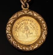 WEST MELBOURNE ALMA FOOTBALL CLUB: An 1889 fob (18ct gold) with chain (15ct gold), 49 grams total, inscribed "Alma Football Club - Presented By T.F. Flanagan For Best All Round Player Season 1889 - Won By John Sharland". - 6