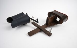 KEYSTONE VIEW COMPANY: Two handheld stereoscopes - one c. 1890s model, and one c. 1920s telebinocular model. (2 items)